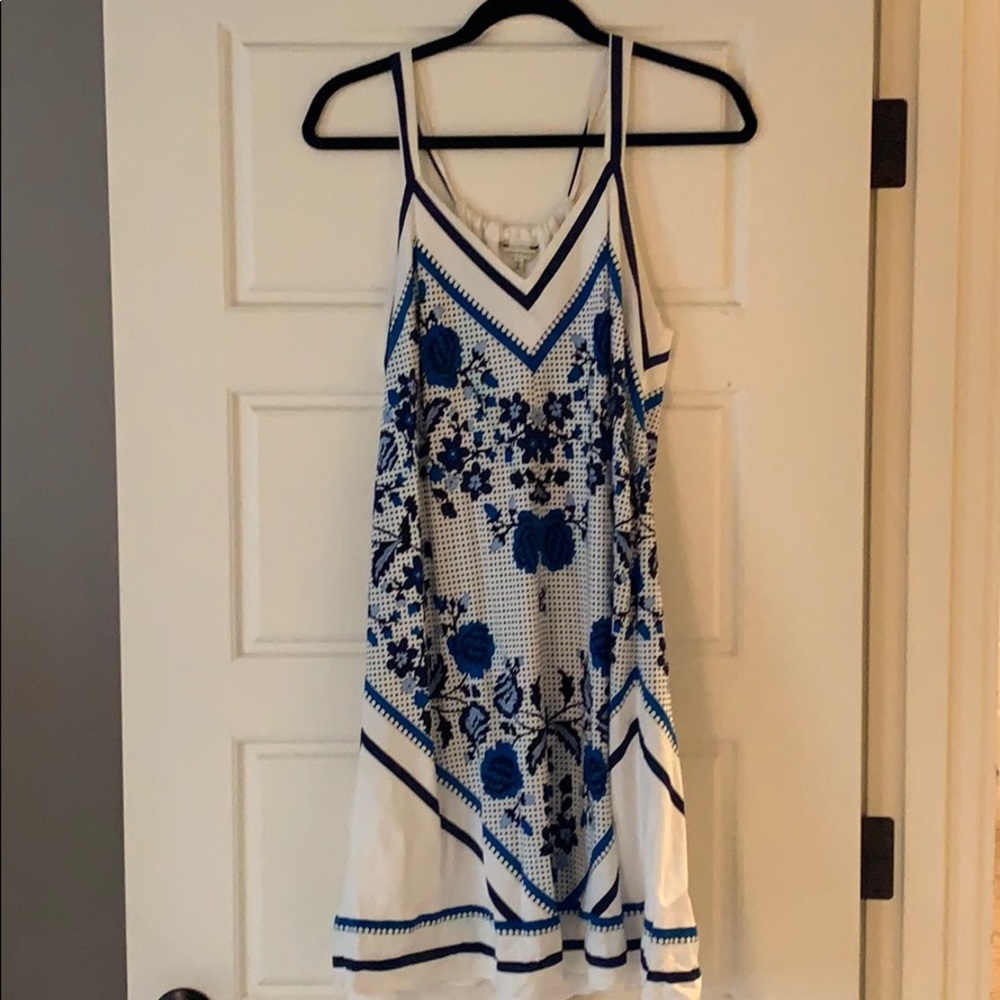 Cute sundress with floral & polka dot design.